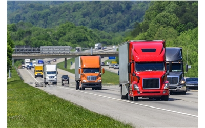 TRUCKS ON HIGHWAY iStock-912235868