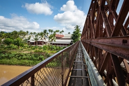 Old Luang Prabang Laos bridge iStock-1190585748