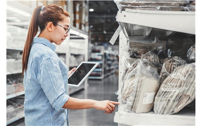 woman in warehouse iStock-1158964050