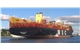 Container_ship_MSC_Maya_with_L_&_R_rear_tractor_prompt_on_the_river_Elbe_with_the_port_of_destination_Hamburg_(cropped)